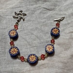 Sun Motif Blue and Red Bracelet